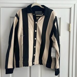 NWT Students Golf black and cream, striped hundred percent cotton jacket